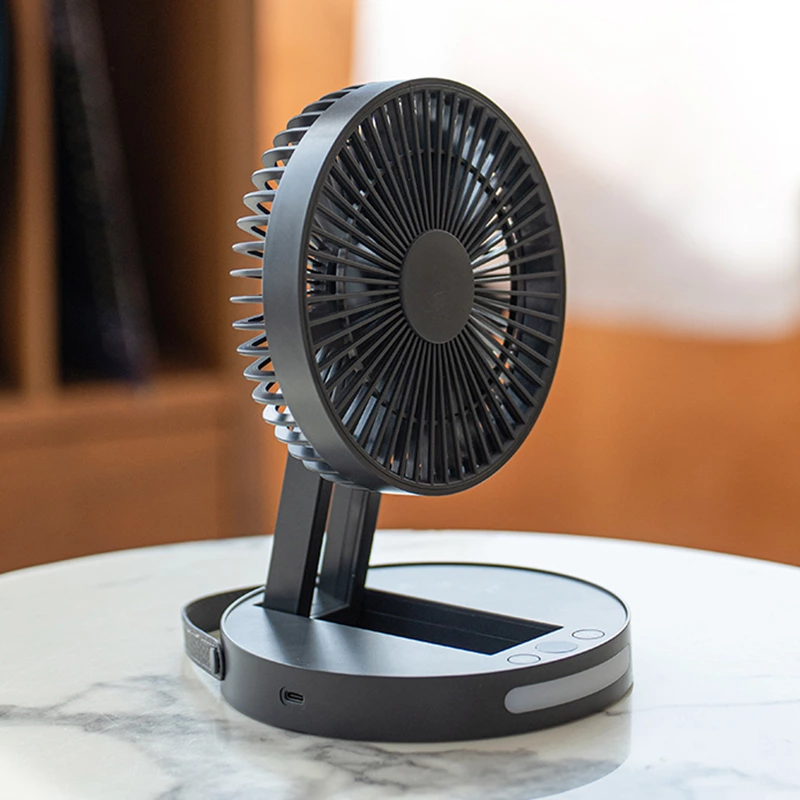 Introducing the Ultimate Desktop Companion: The Multifunctional Foldable Indoor Fan