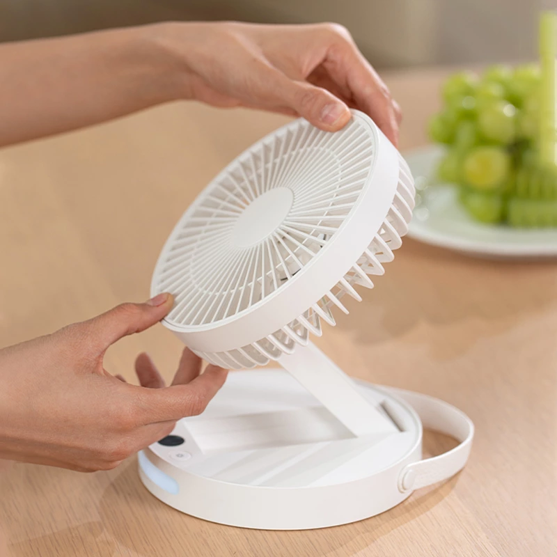 Introducing the Ultimate Desktop Companion: The Multifunctional Foldable Indoor Fan