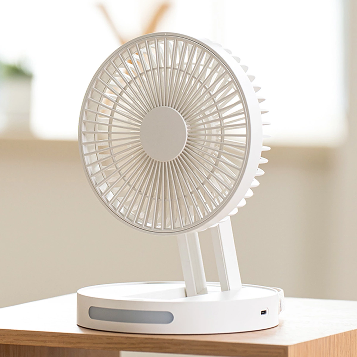 Introducing the Ultimate Desktop Companion: The Multifunctional Foldable Indoor Fan